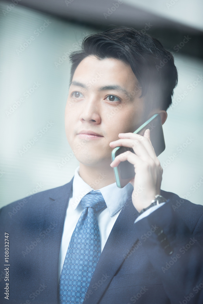 Businessman talking on smart phone