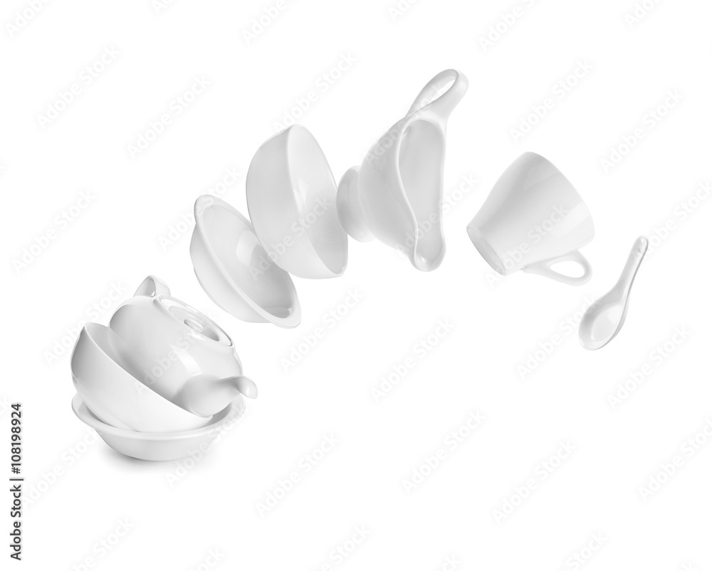 dishes in flight on white background