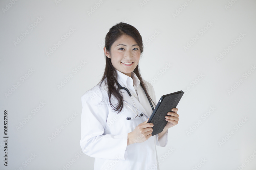 Young female doctors have a electronic medical records