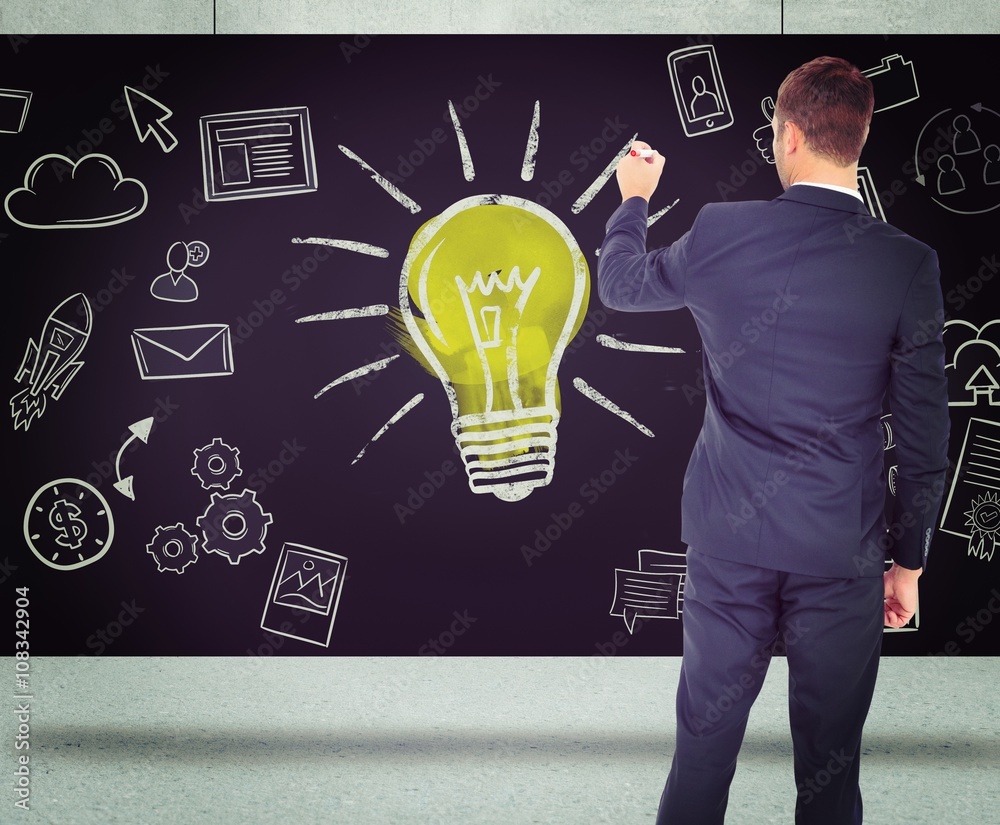 Composite image of business man writing with chalk