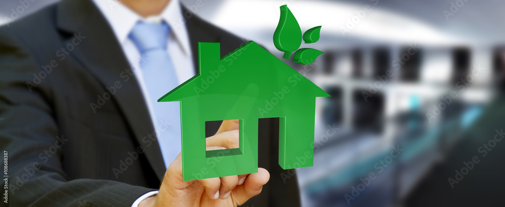 Businessman holding 3D eco house and energy efficiency