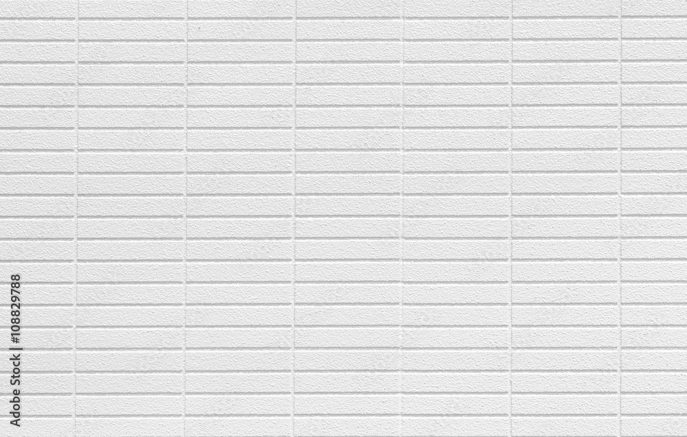 The modern white concrete tile wall background..