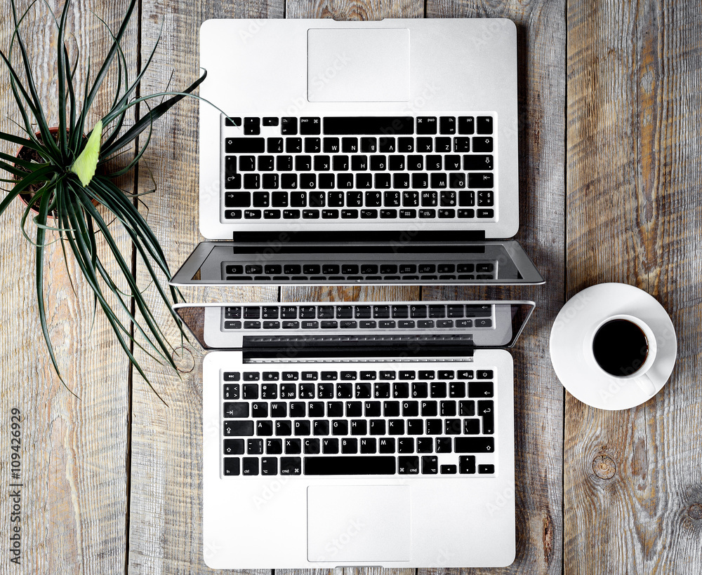 working place at home for two on wooden table