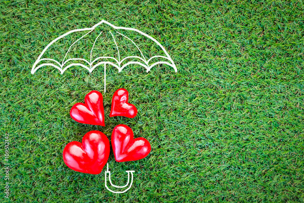 love concept with hearts on green grass