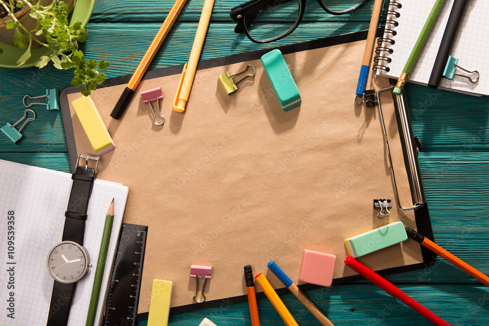 notepad and office supplies on the desk