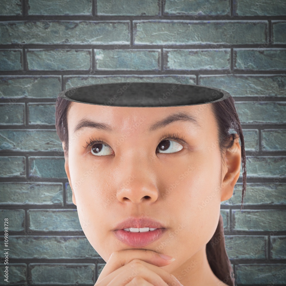 Composite image of thoughtful asian businesswoman