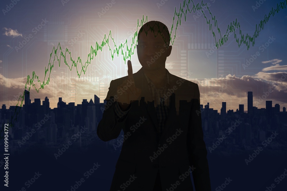 Composite image of focused businessman pointing