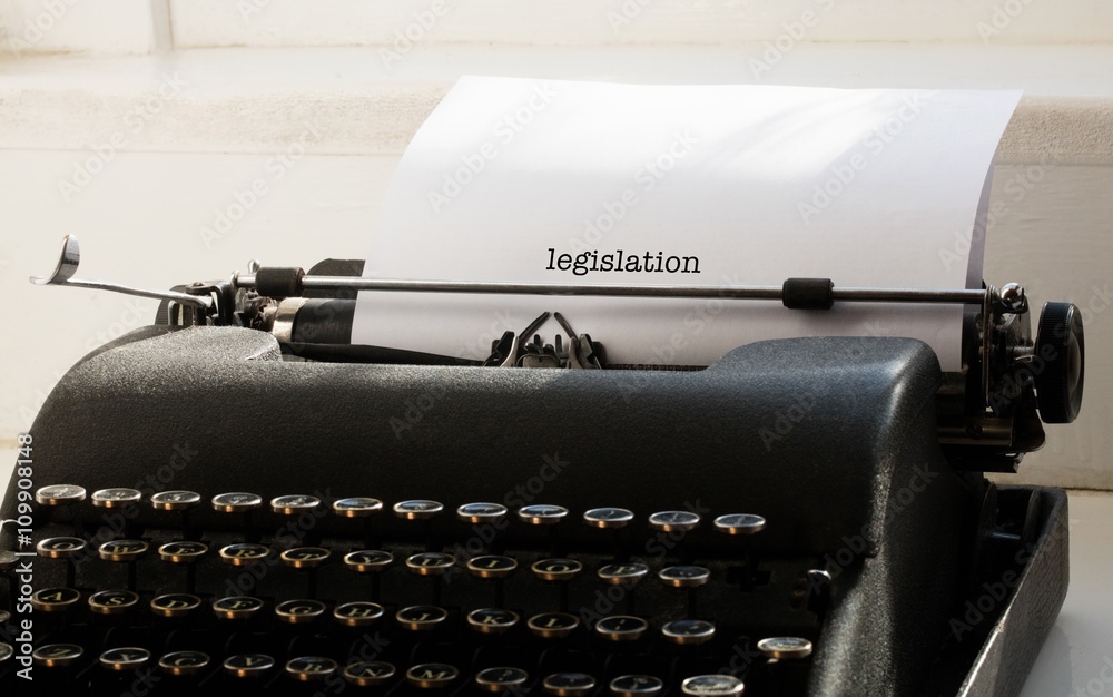 Legislation against typewriter on a table