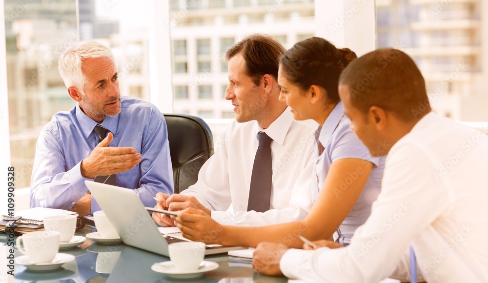 Group of business people brainstorming together