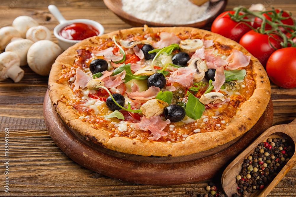 Rustic pizza with ingredients, top view