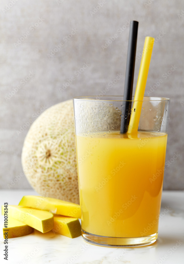 glass of melon and mango juice