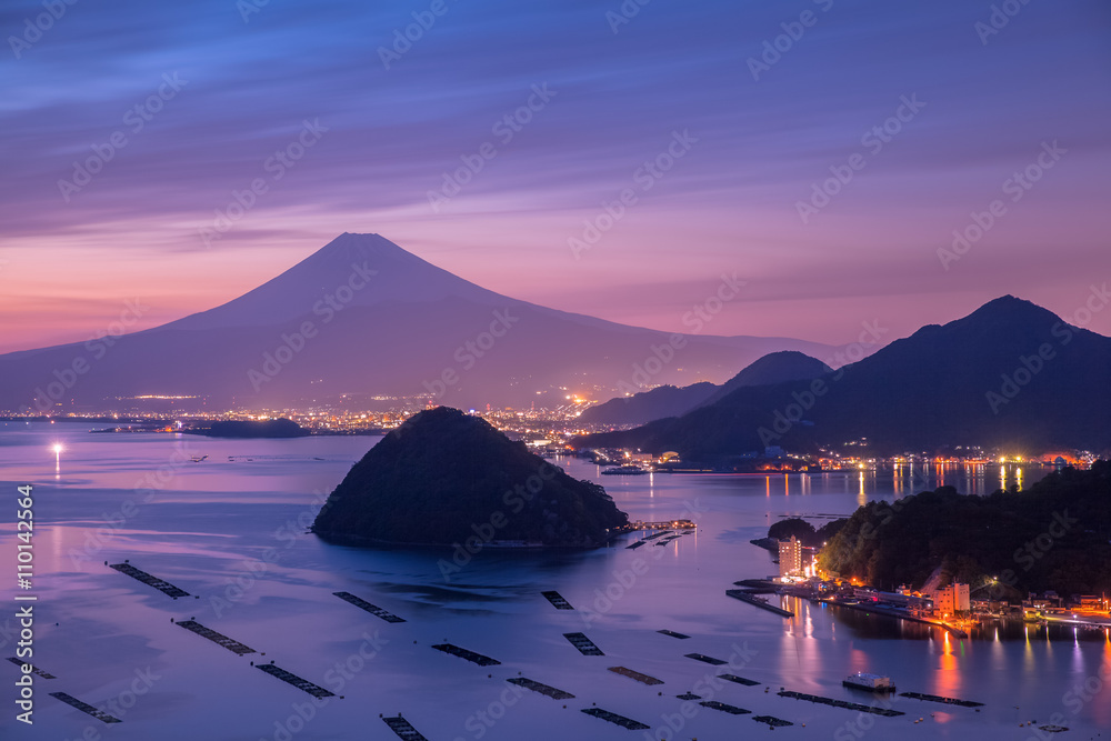 View of Mount Fuji with Suruga bay and Numazu town in twilight time