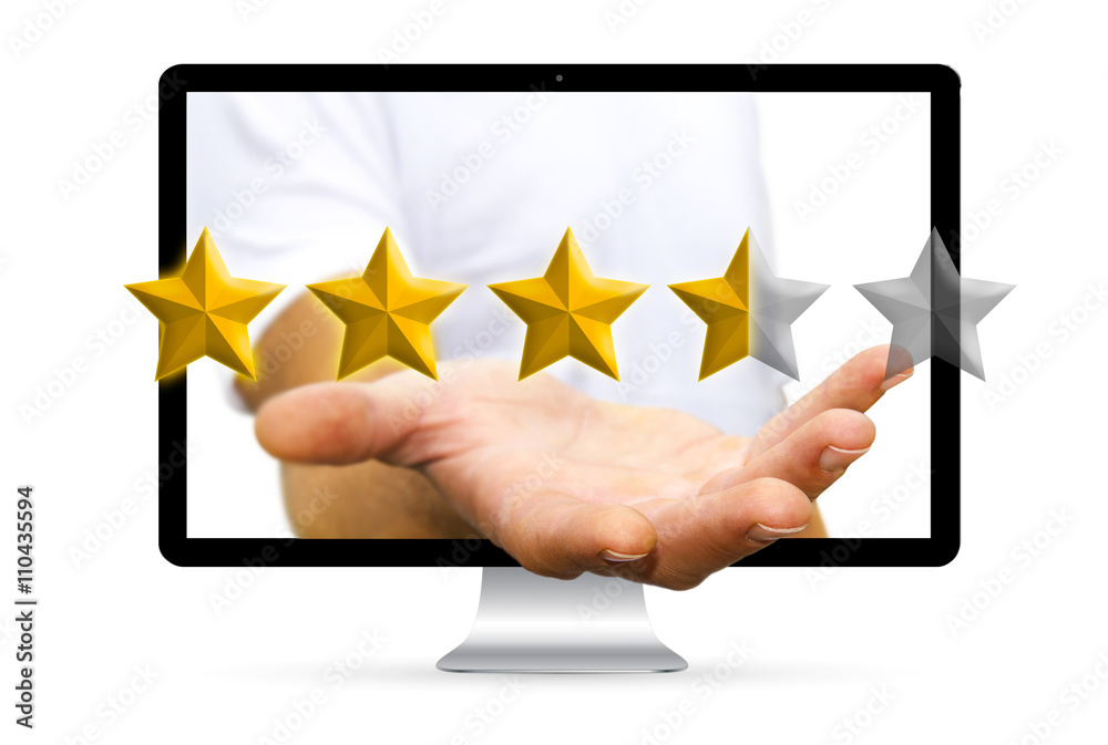 Young businessman ranking with his hand using digital star