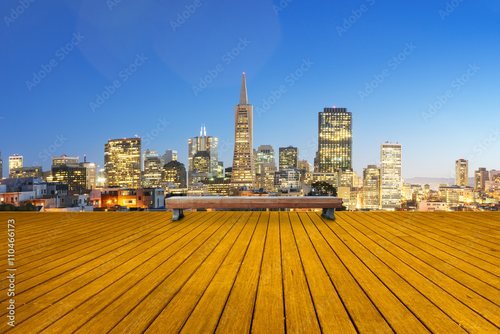 empty wood footpath with cityscape and skyline of san francisco