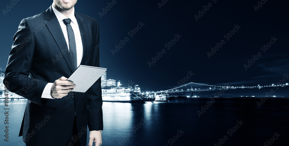 businessman with tablet with passenger liner on water in san fra