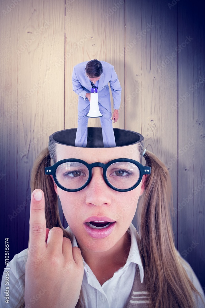 Composite image of  businessman talking through megaphone