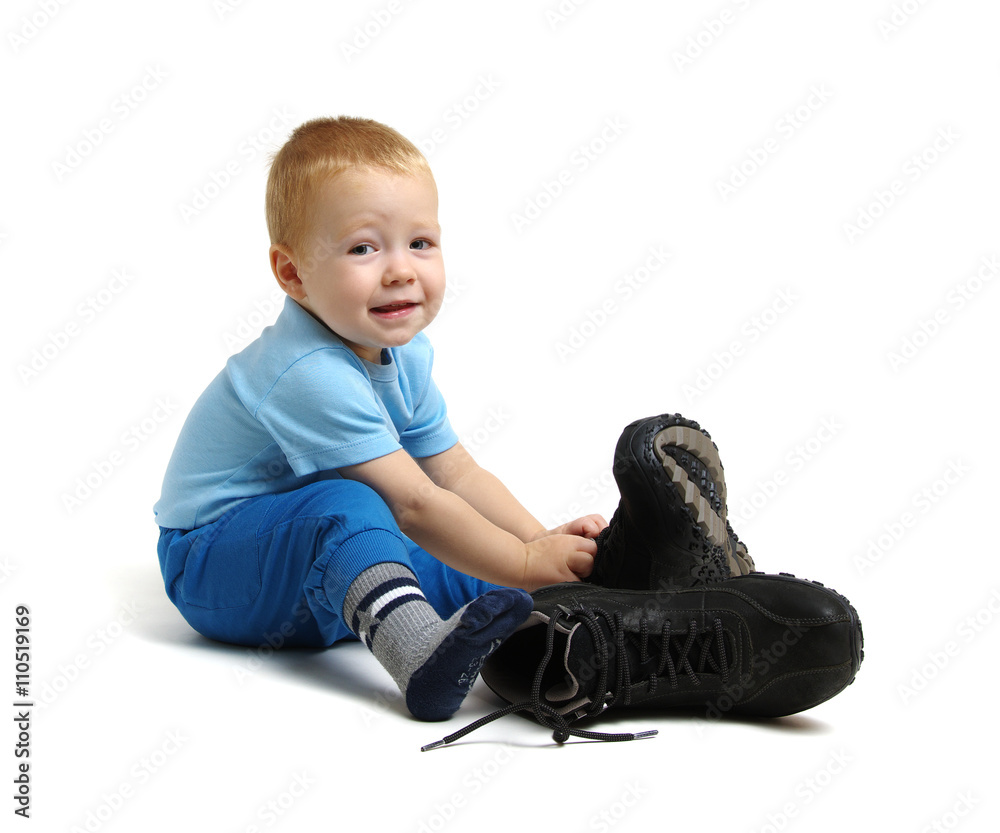 boy in fathers shoes