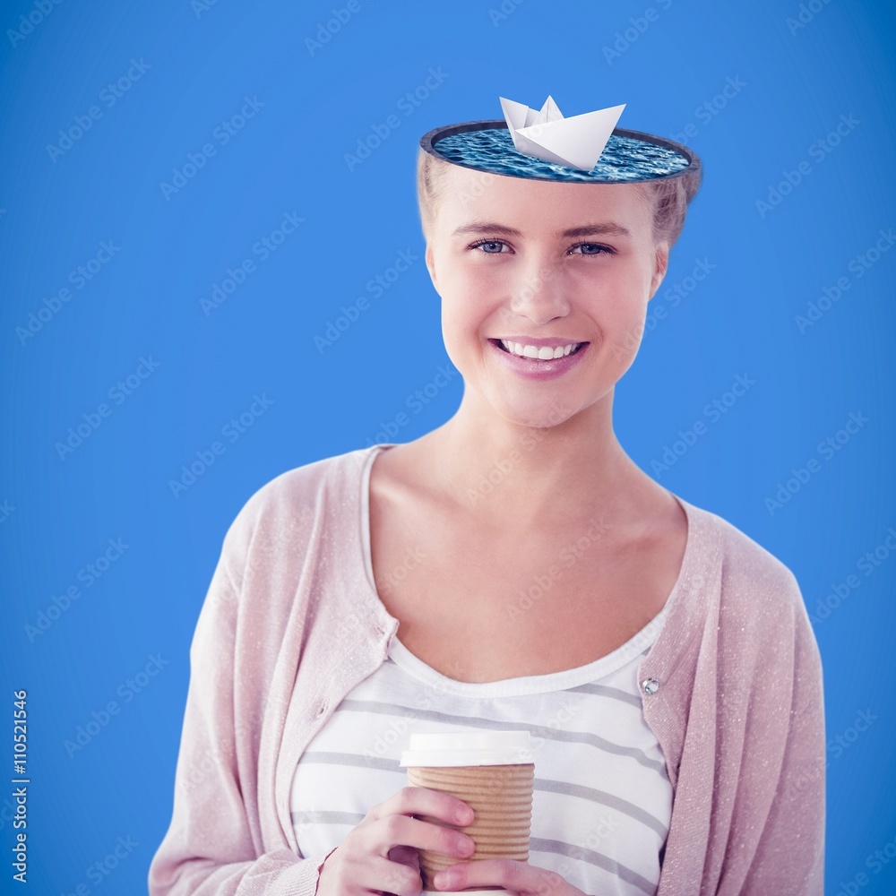 Composite image of portrait of smiling woman holding coffee cup 