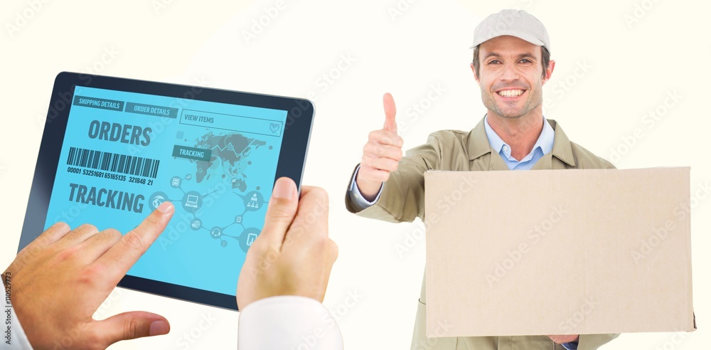 Composite image of man using tablet pc