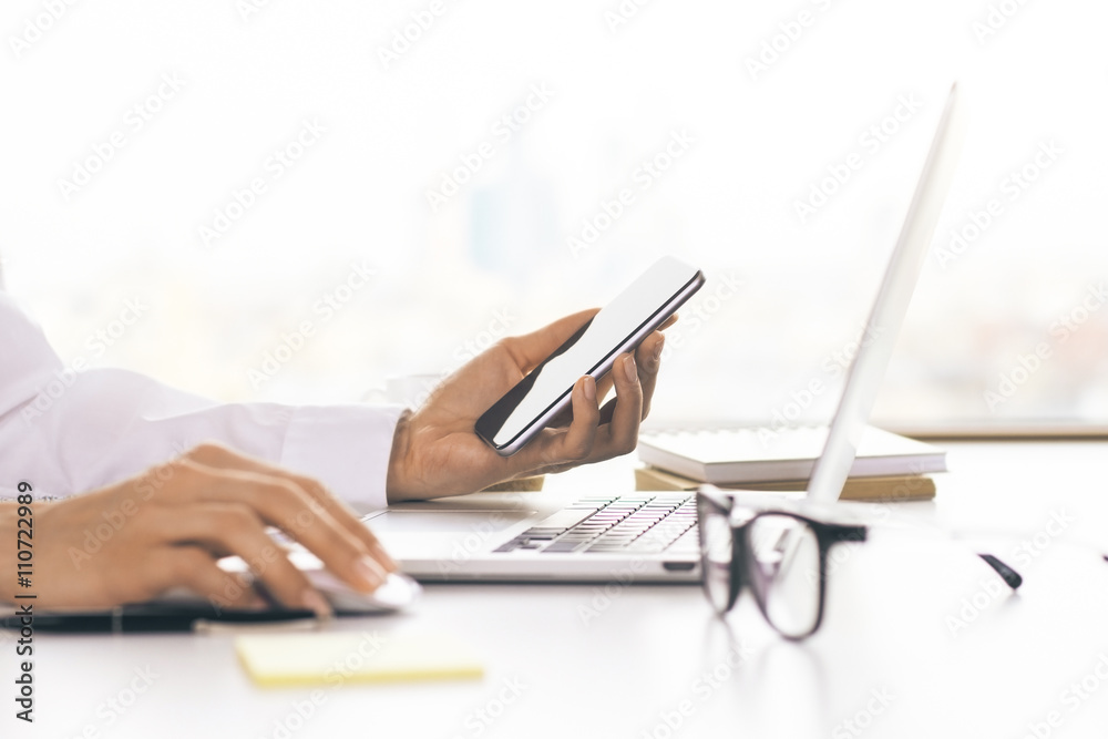 Woman using technology in office