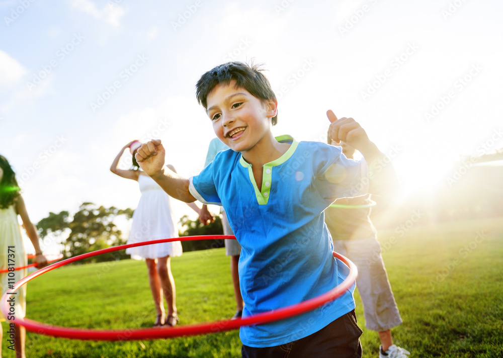 Whole Family Hula Hooping Outdoors Togetherness Concept