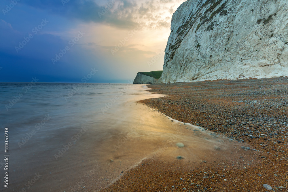 White cliffs on the Jurassic Coast of Dorset at sunset, UK