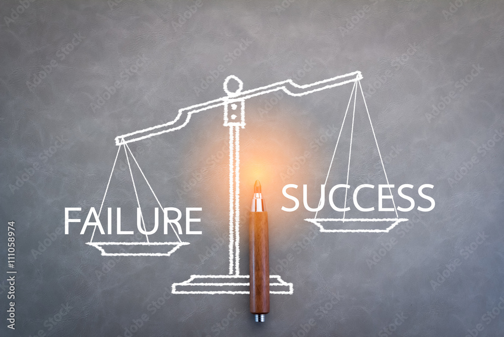 failure and success word on scale