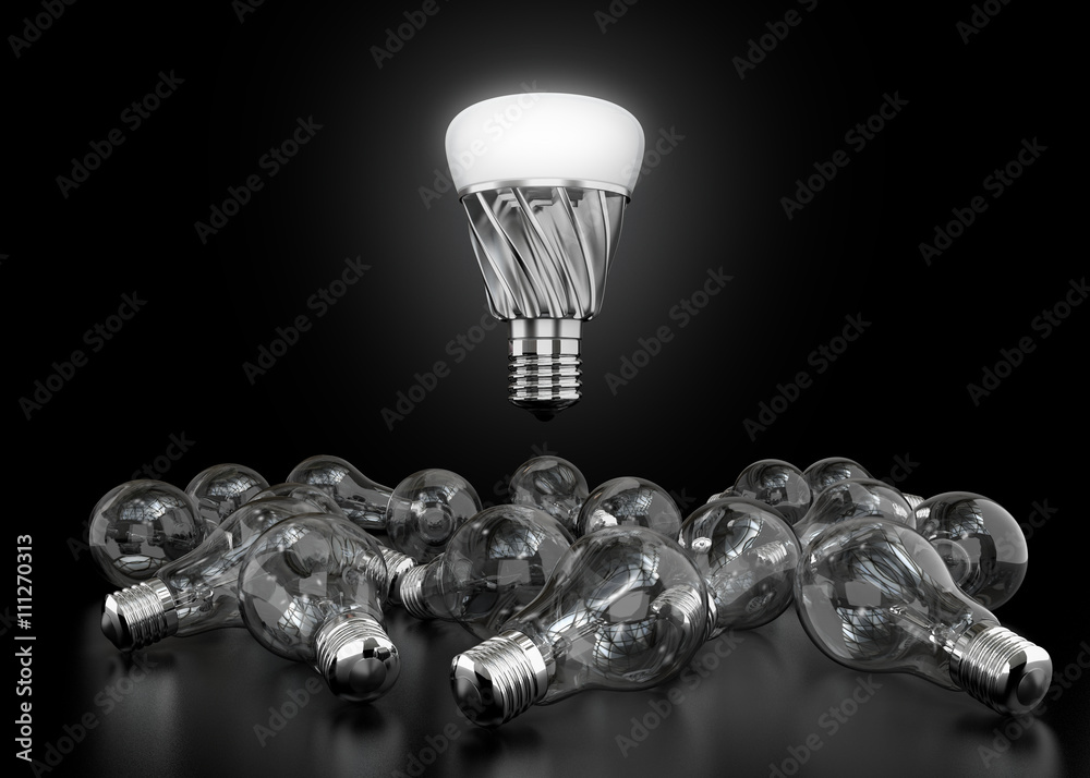 LED light bulb shining in midair, Incandescent light bulbs lay down on black ground. New light equip