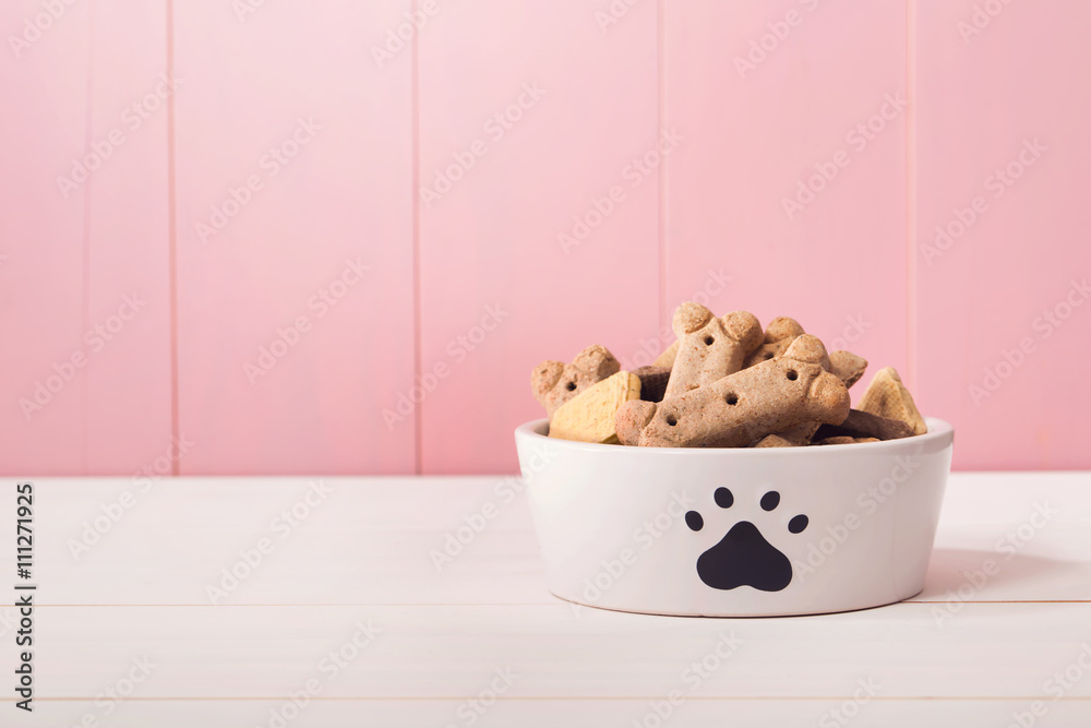 Dog food in a bowl filled with treats