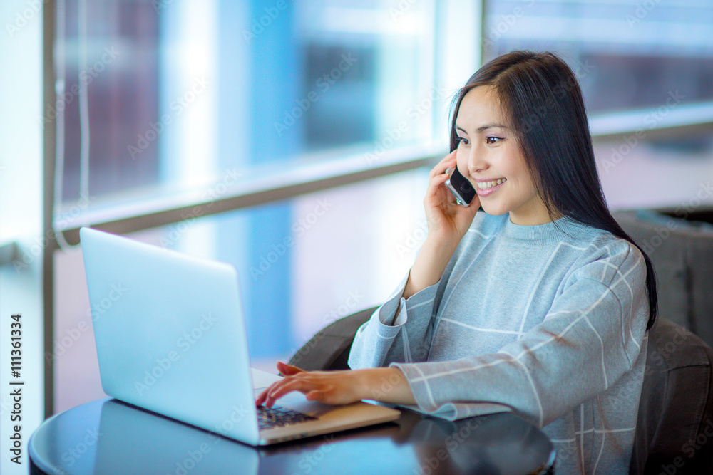 Female using laptop