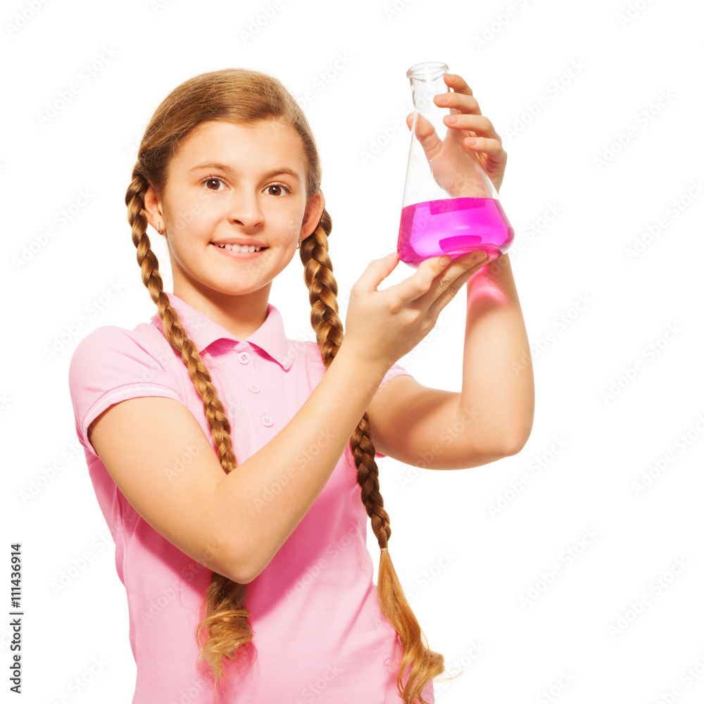 Young scientist pouring chemicals at the flask