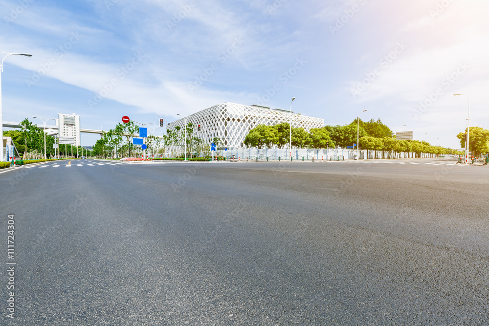 Asphalt roads and modern urban architecture scene in Shanghai