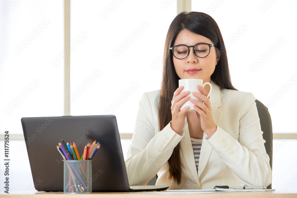 Asian Smiling business women enjoy Coffee Break