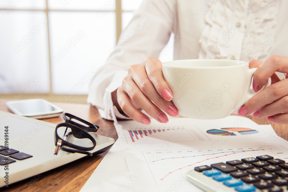 Businesswoman Savoring her morning coffee