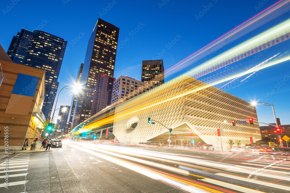 smart traffic on road in downtown of los angeles at night