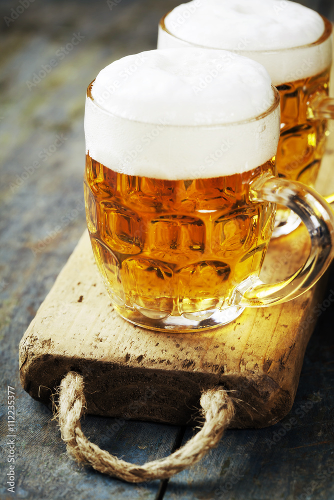  beer on wood background with copyspace