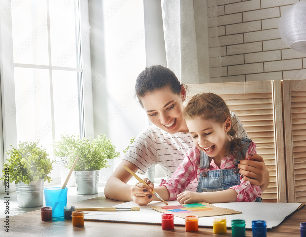 Mother and daughter paint