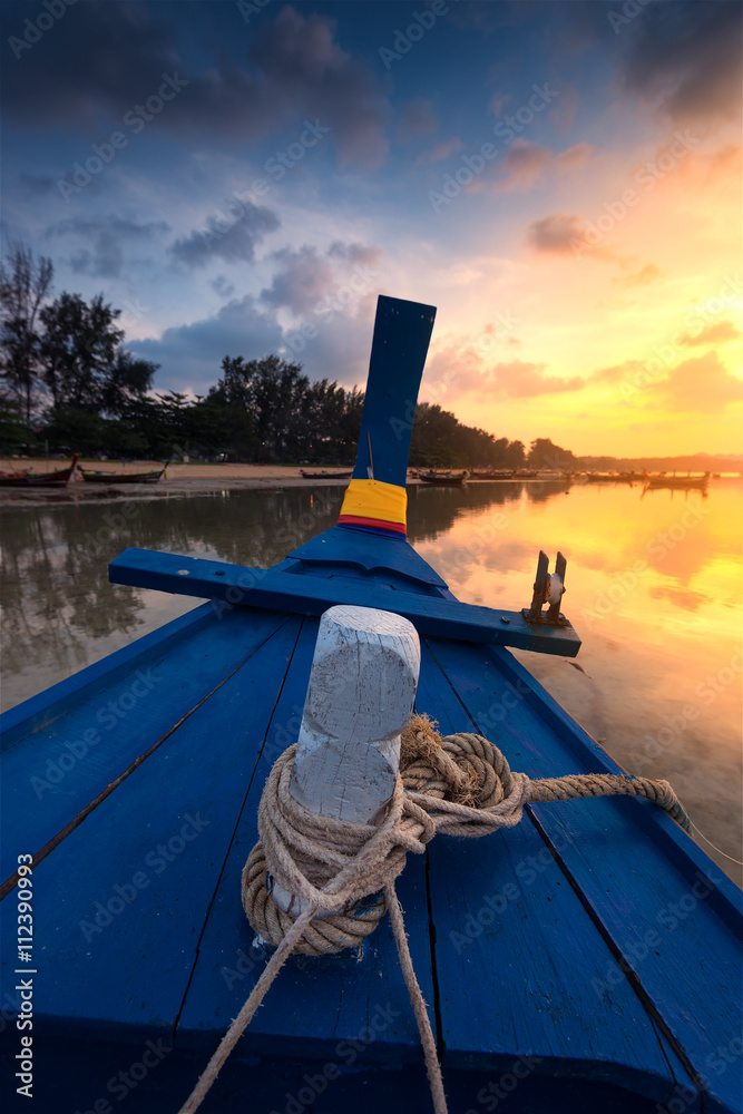 Long tail boat at sunrise in Thailand.