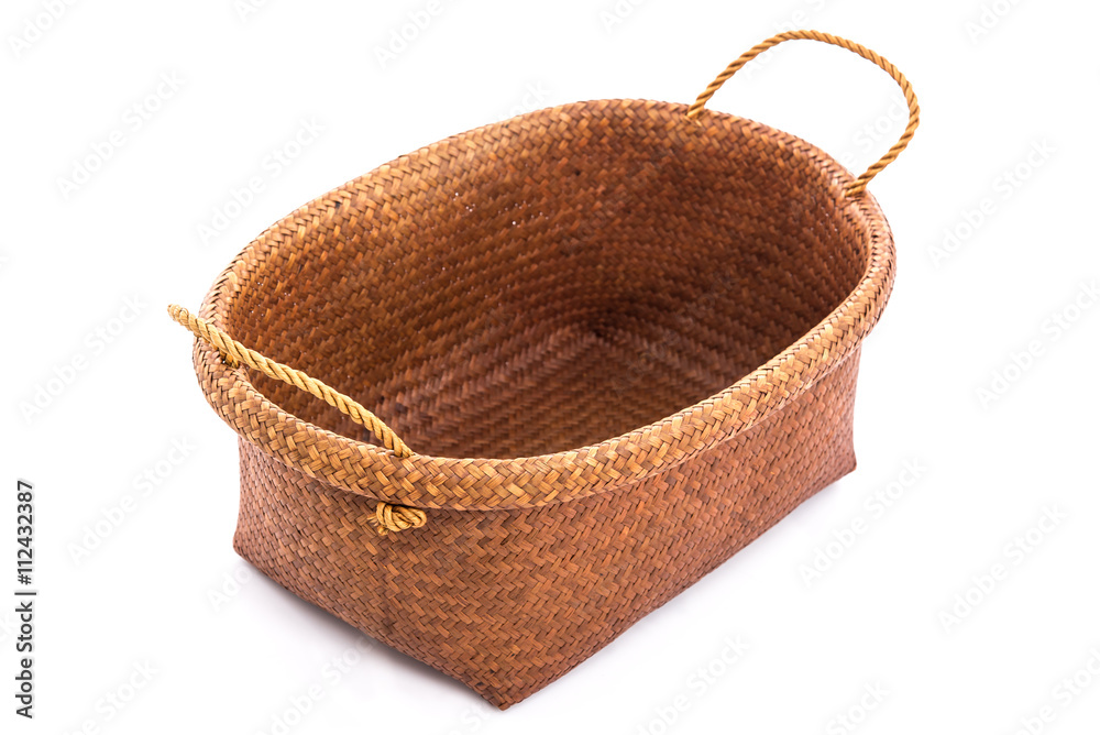 Empty wicker basket on white background