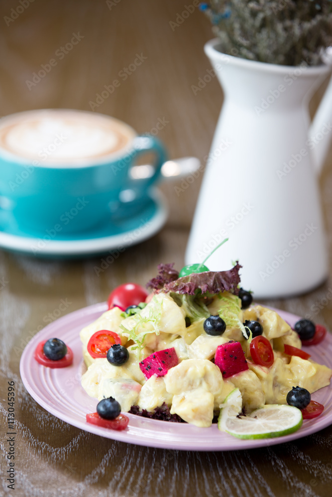 delicious fruit salad on table