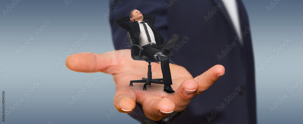 Man relaxing on his chair at the office