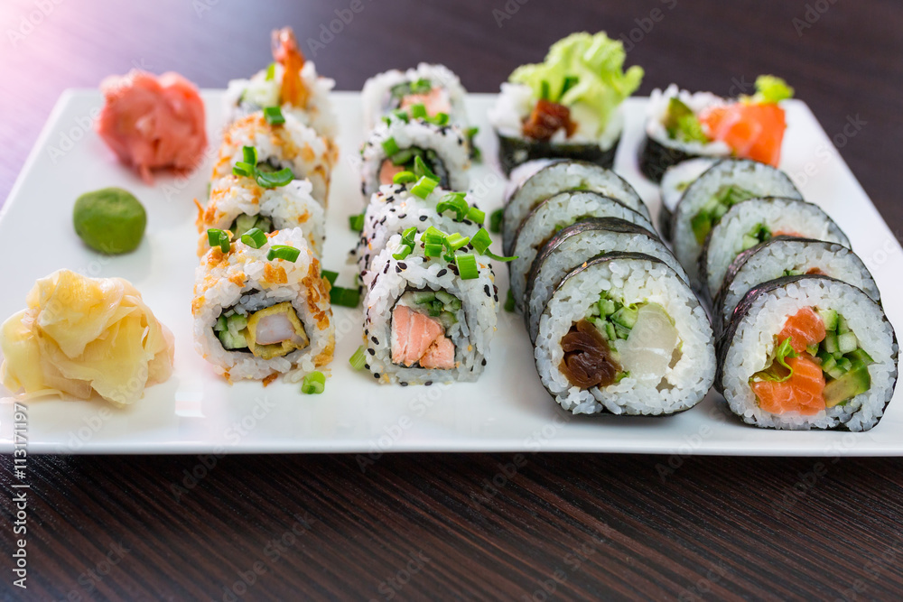 Sushi set with chopsticks on the plate