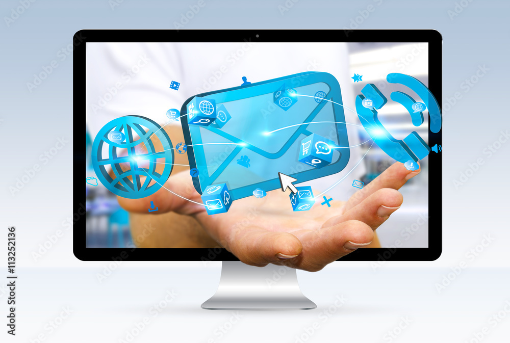 Businessman holding a digital 3D email icon in his hand