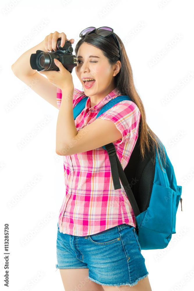 Happy asian woman tourist taking photos