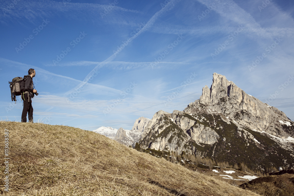 Hiker photographer on a mountain top