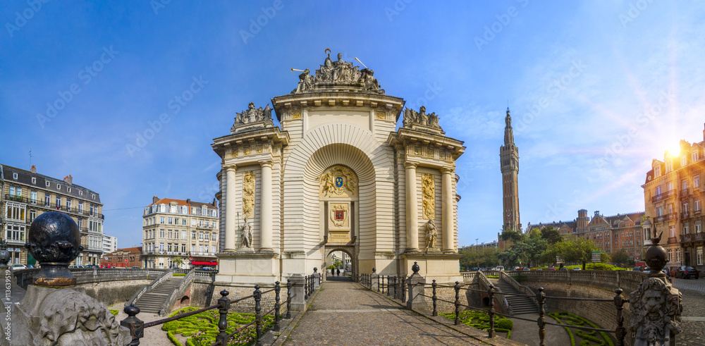 View of french city Lille with belfry, council hall and Paris’ gate