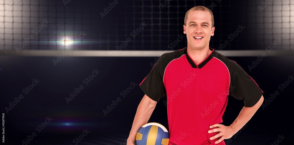 Composite image of sportsman holding a volleyball