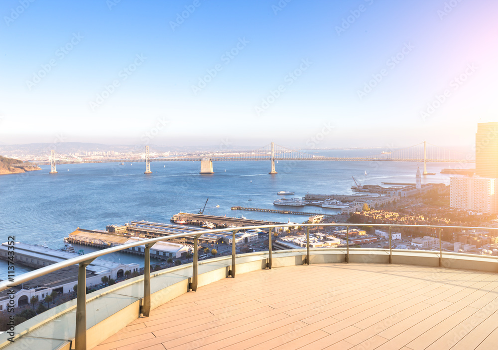 bay bridge with cityscape and skyline of san francisco