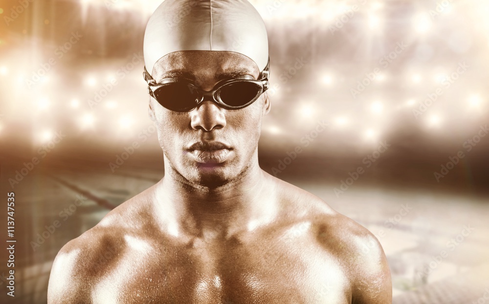 Swimmer posing with swimming goggles