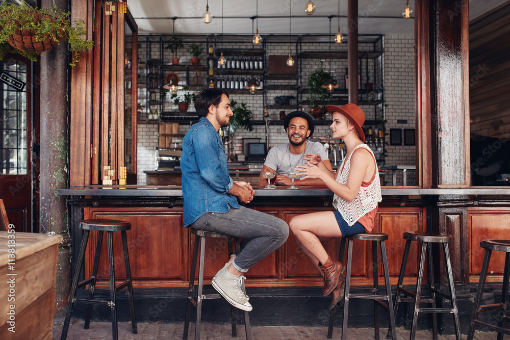 Group of young people meeting in a coffee shop